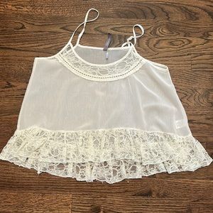 Paper Crane, semi crop (longer in back), adjustable strap, shear top